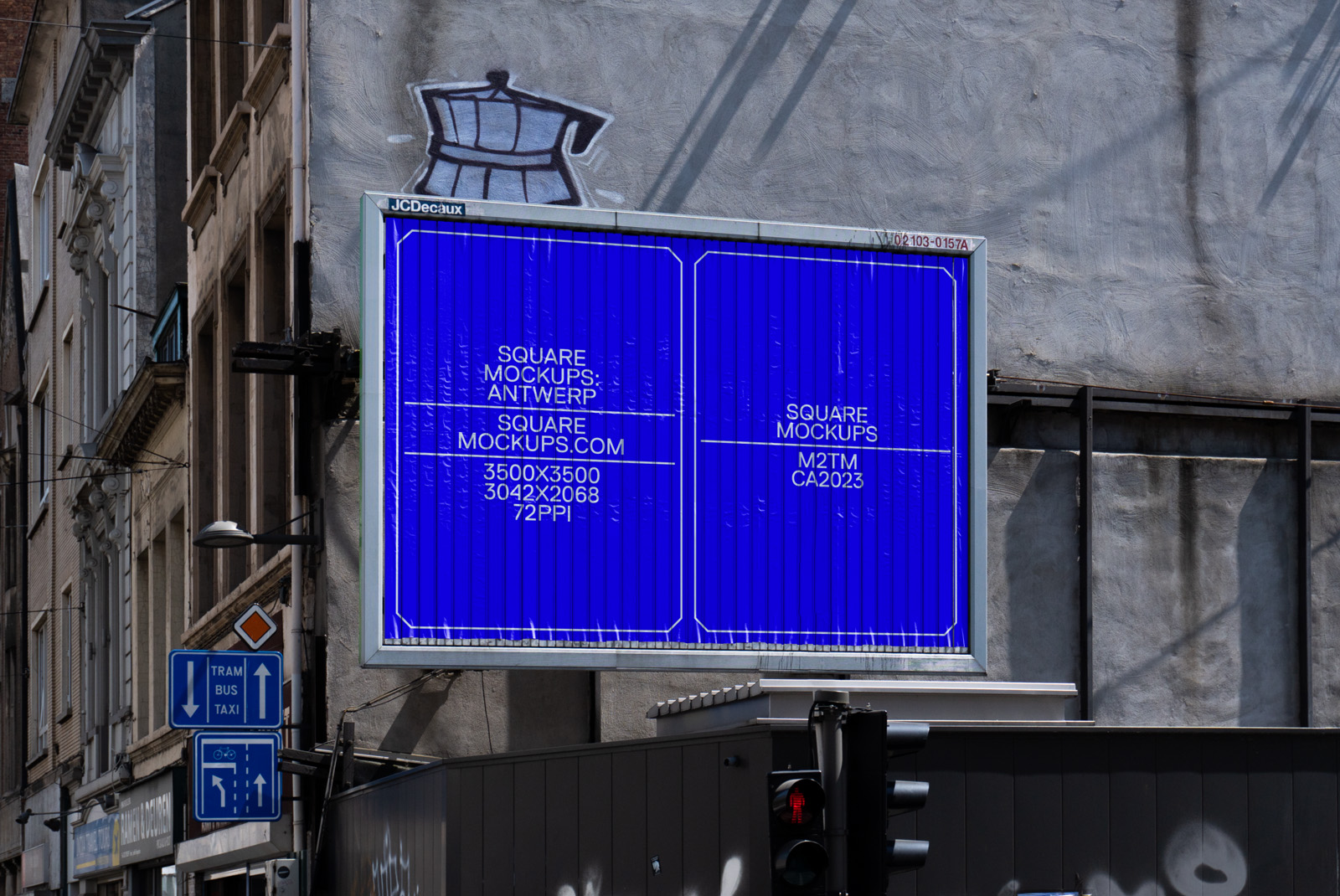 Urban billboard mockup displayed on a street, showcasing a blue design for graphic designers and advertisers to present their work.